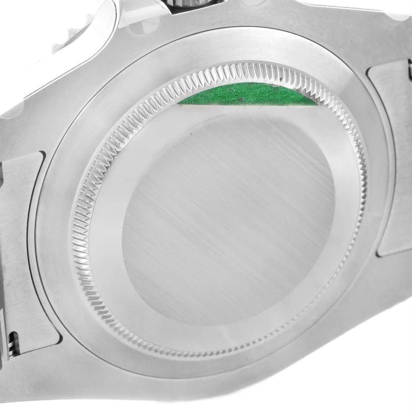 This image shows the back case of the Rolex Submariner 114060 Men
s Stainless Steel Black Dial 114060 Men
s Stainless Steel Black Dial watch at a close-up angle.