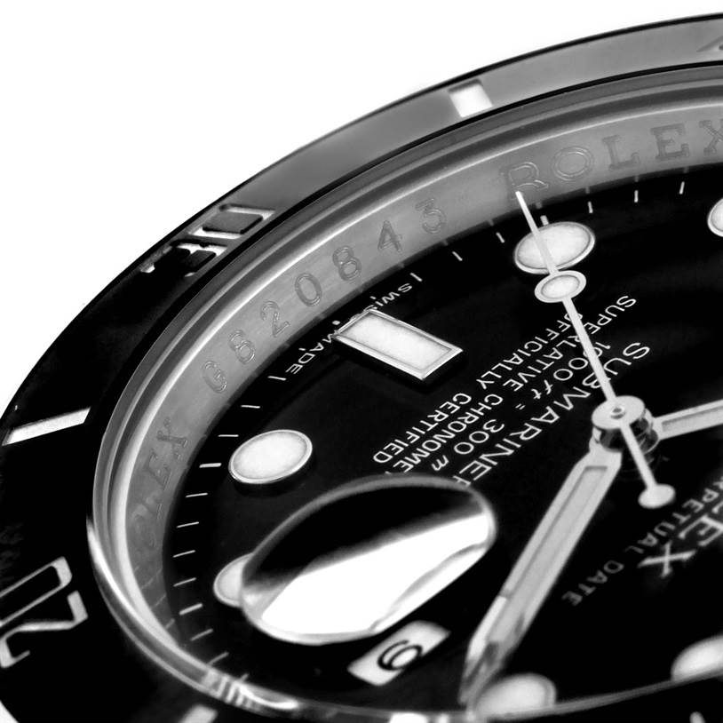 Close-up angle of the Rolex Submariner 116610LN Men
s Stainless Steel Black Dial 116610LN Men
s Stainless Steel Black Dial watch, showing the dial, bezel, and part of the crystal with date magnifier.