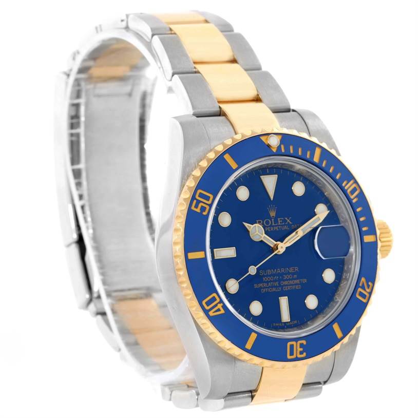 This image shows a Rolex Submariner 116613 Men's Steel and Gold (two tone) Blue Dial 116613 Men's Steel and Gold (two tone) Blue Dial watch at an angle highlighting its blue dial, blue bezel, and two-tone metal bracelet.