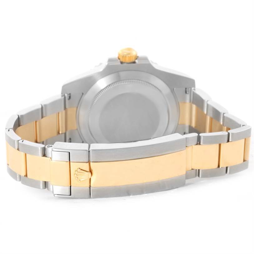 The image shows the back case and bracelet of the Rolex Submariner 116613 Men's Steel and Gold (two tone) Blue Dial 116613 Men's Steel and Gold (two tone) Blue Dial, with a focus on the clasp and links.