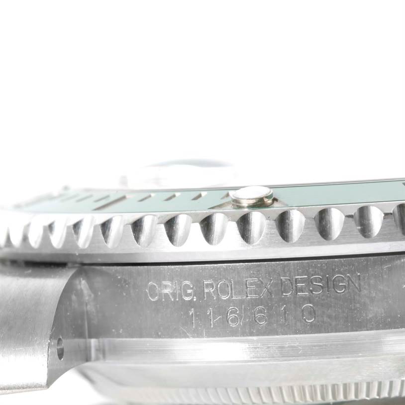 The image shows a side view of a Rolex Submariner 116610LV Men's Stainless Steel Green Dial 116610LV Men's Stainless Steel Green Dial, highlighting the bezel, crown, and engraved case with the model number 116610.