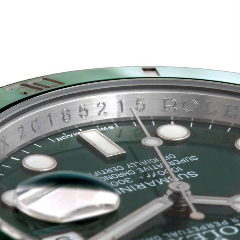 The image shows a close-up angle focusing on the dial, bezel, and part of the engraving of a Rolex Submariner 116610LV Men's Stainless Steel Green Dial 116610LV Men's Stainless Steel Green Dial watch.