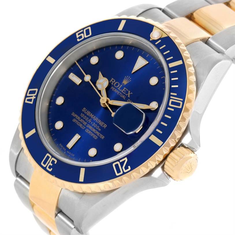 The image shows a top-front angle of the Rolex Submariner 16613 Men's Steel and Gold (two tone) Blue Dial 16613 Men's Steel and Gold (two tone) Blue Dial watch, highlighting its blue dial, bezel, and metal bracelet.