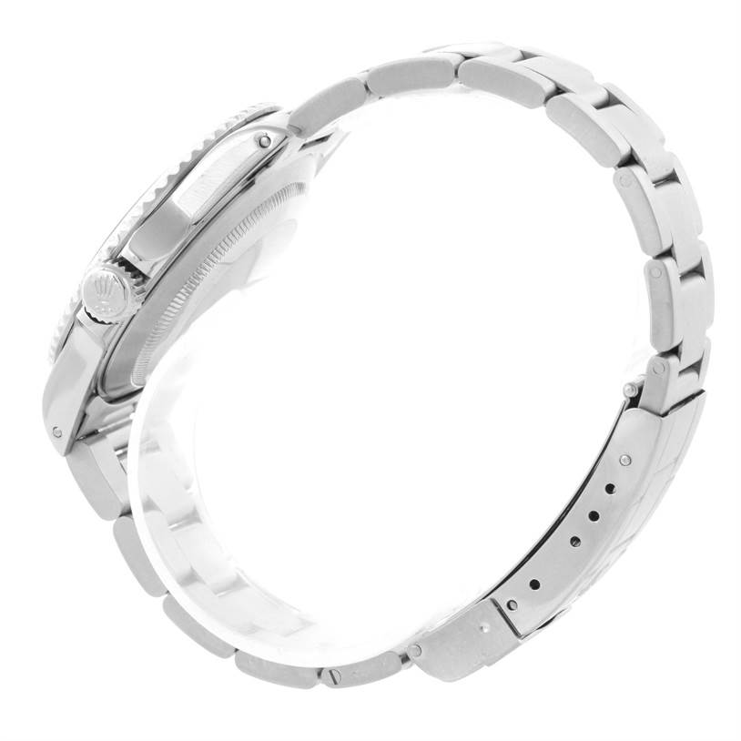 This image shows a side view of a Rolex Submariner 14060 Men
s Stainless Steel Black Dial 14060 Men
s Stainless Steel Black Dial watch, highlighting the crown, bezel, and bracelet links.