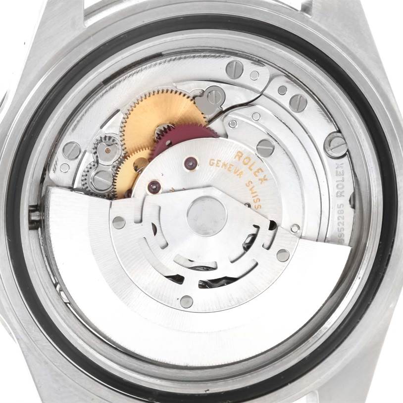 This image shows the internal mechanical movement of a Rolex Submariner 14060 Men
s Stainless Steel Black Dial 14060 Men
s Stainless Steel Black Dial watch from a back view angle.