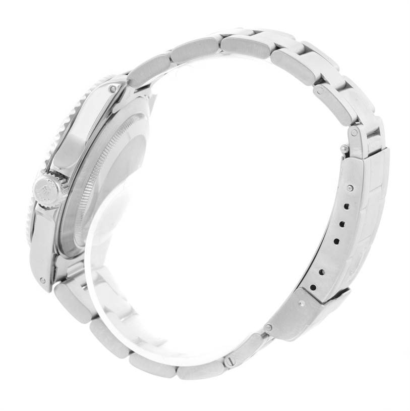 The image shows a side view of the Rolex Submariner 14060 Men
s Stainless Steel Black Dial 14060 Men
s Stainless Steel Black Dial, highlighting the bracelet, clasp, crown, and case back.