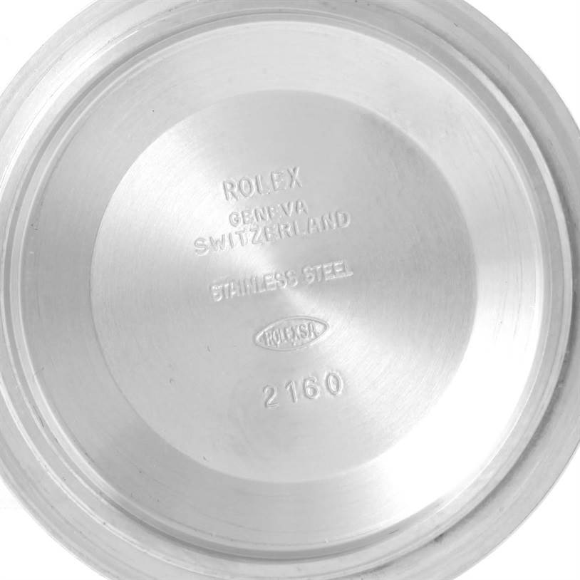 This is an inside view of the case back for a Rolex Submariner 14060 Men
s Stainless Steel Black Dial 14060 Men
s Stainless Steel Black Dial watch, showing engravings and markings.