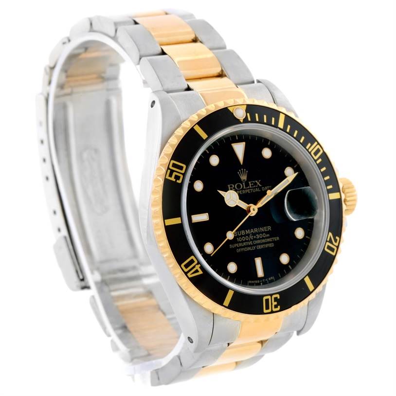 This image shows a Rolex Submariner 16613 Men's Steel and Gold (two tone) Black Dial 16613 Men's Steel and Gold (two tone) Black Dial watch at a three-quarter angle, highlighting the bezel, dial, and two-tone bracelet.