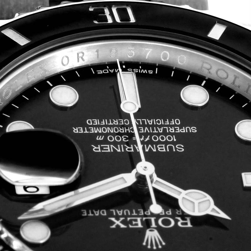 The image shows a close-up view of the Rolex Submariner 116610LN Men
s Stainless Steel Black Dial 116610LN Men
s Stainless Steel Black Dial watch face, focusing on the dial, hands, and part of the bezel.