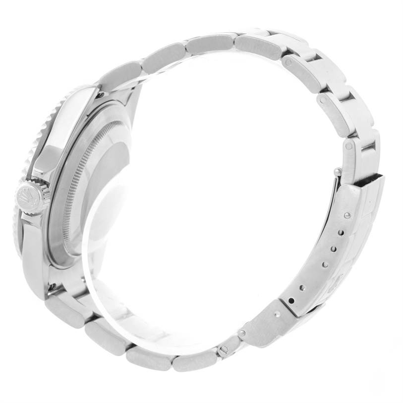 The image shows a side view of the Rolex Submariner 16610 Men
s Stainless Steel Black Dial 16610 Men
s Stainless Steel Black Dial, featuring its case, crown, and bracelet with clasp.