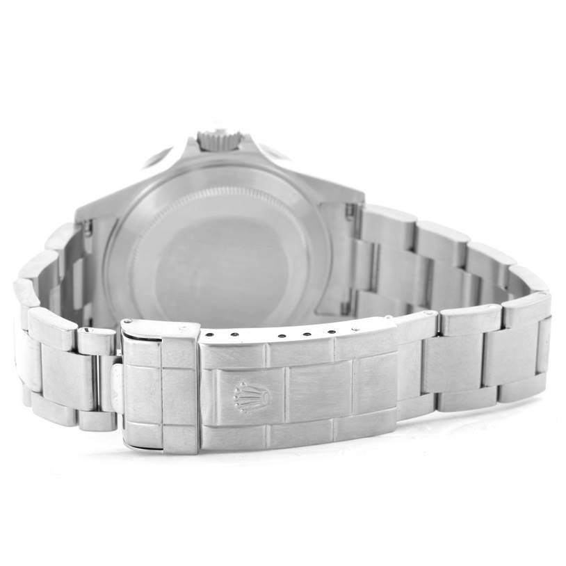 This image shows the back case and partial bracelet of a Rolex Submariner 16610 Men
s Stainless Steel Black Dial 16610 Men
s Stainless Steel Black Dial watch.