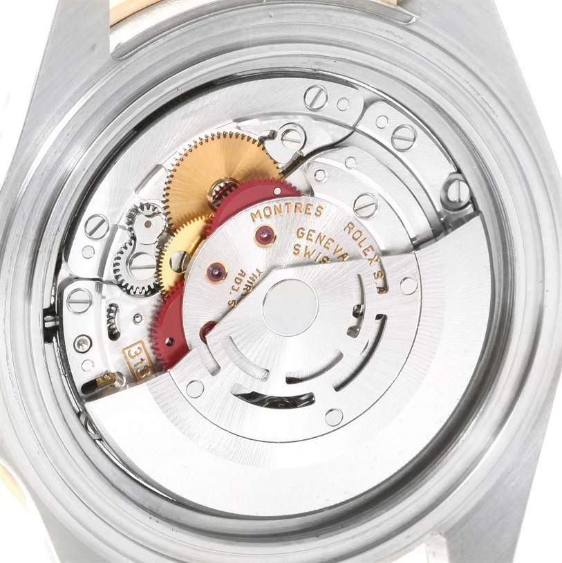 The image shows the internal mechanical movement of a Rolex Submariner 16613 Men's Steel and Gold (two tone) Black Dial 16613 Men's Steel and Gold (two tone) Black Dial watch viewed from the back.