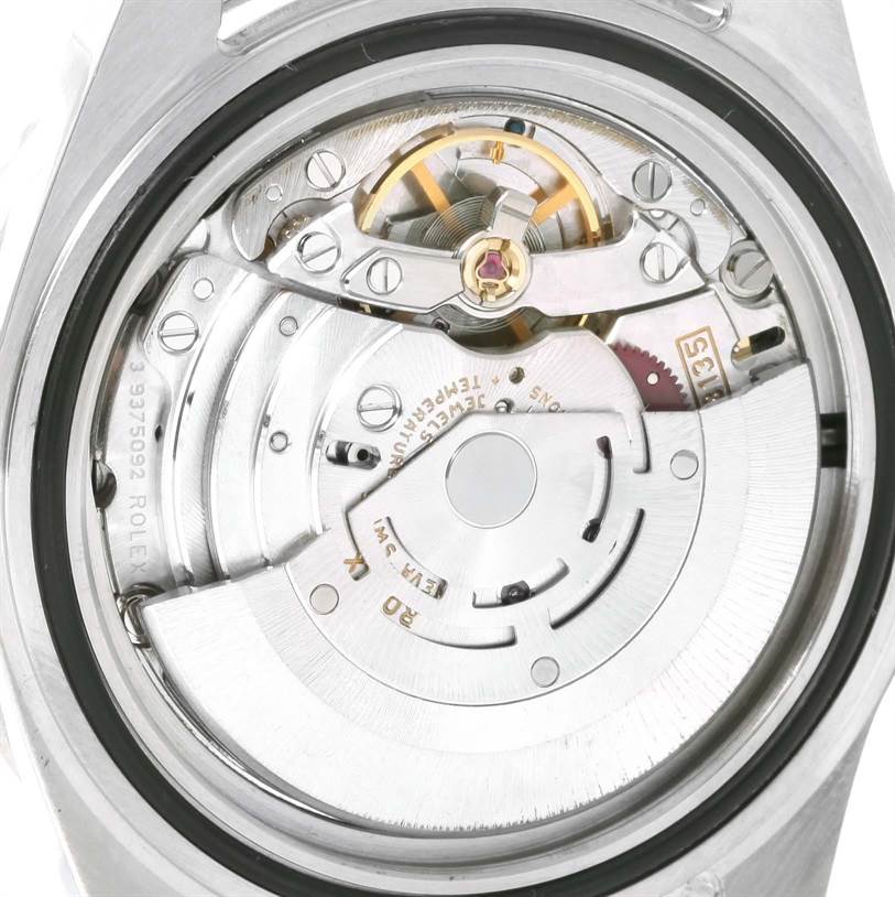 This image shows the internal movement mechanism of a Rolex Submariner 16610 Men
s Stainless Steel Black Dial 16610 Men
s Stainless Steel Black Dial watch viewed from the back.
