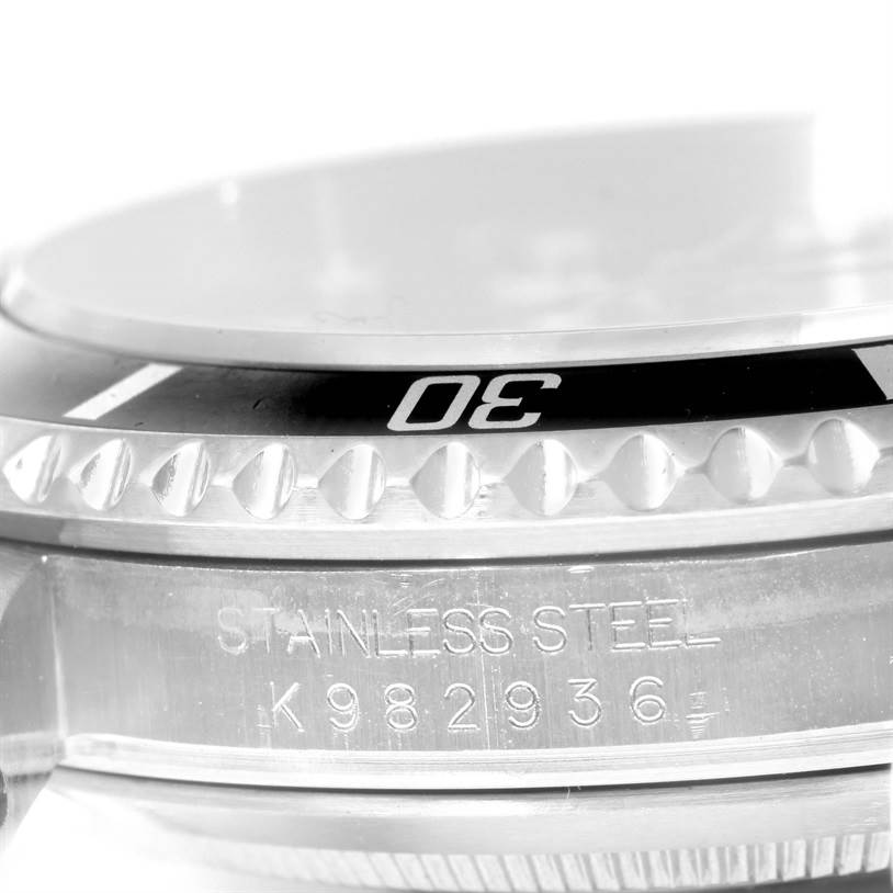 This close-up angle shows the bezel and stainless steel casing of a Rolex Submariner 16610 Men
s Stainless Steel Black Dial 16610 Men
s Stainless Steel Black Dial watch.