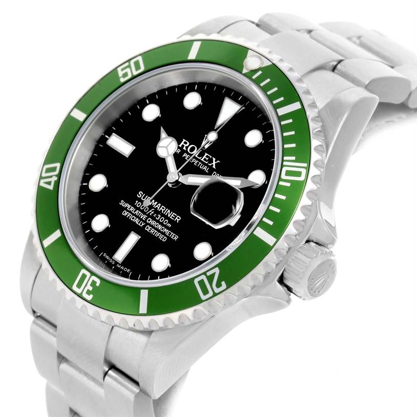 The image shows a Rolex Submariner 16610LV Men
s Stainless Steel Black Dial 16610LV Men
s Stainless Steel Black Dial watch at an angled view, highlighting its green bezel, black dial, bracelet, and crown.