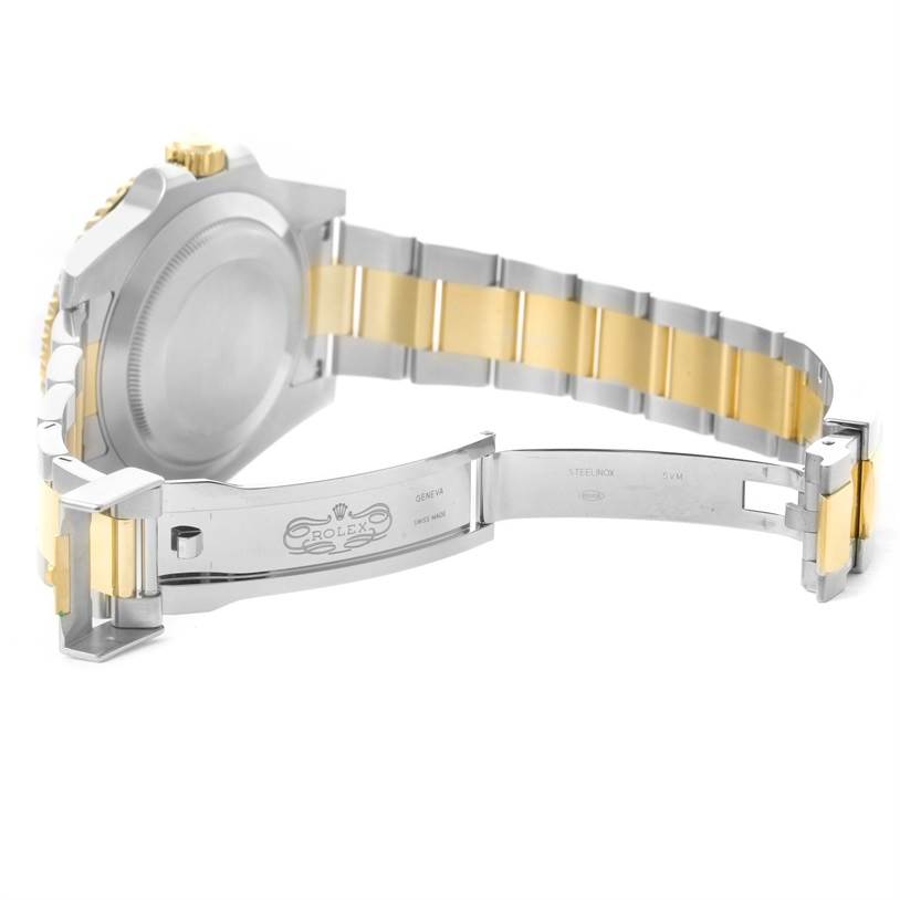 This image displays the back case and bracelet of the Rolex Submariner 116613 Men's Steel and Gold (two tone) Blue Dial 116613 Men's Steel and Gold (two tone) Blue Dial, showcasing its two-tone design and clasp mechanism.