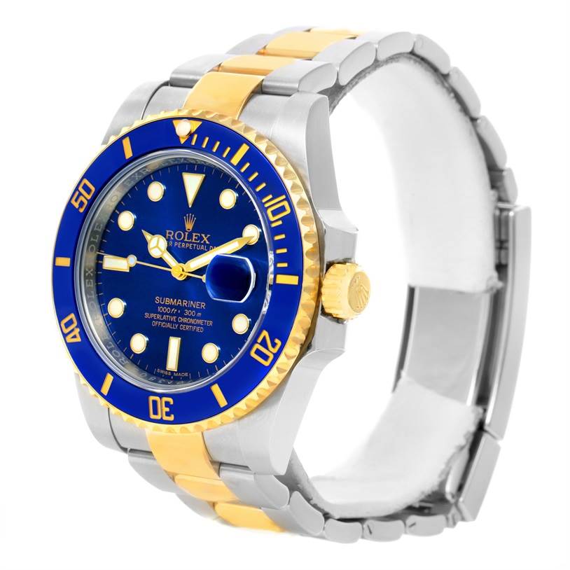 This image shows a side angle view of the Rolex Submariner 116613 Men's Steel and Gold (two tone) Blue Dial 116613 Men's Steel and Gold (two tone) Blue Dial watch, featuring its blue dial, two-tone band, and rotating bezel.