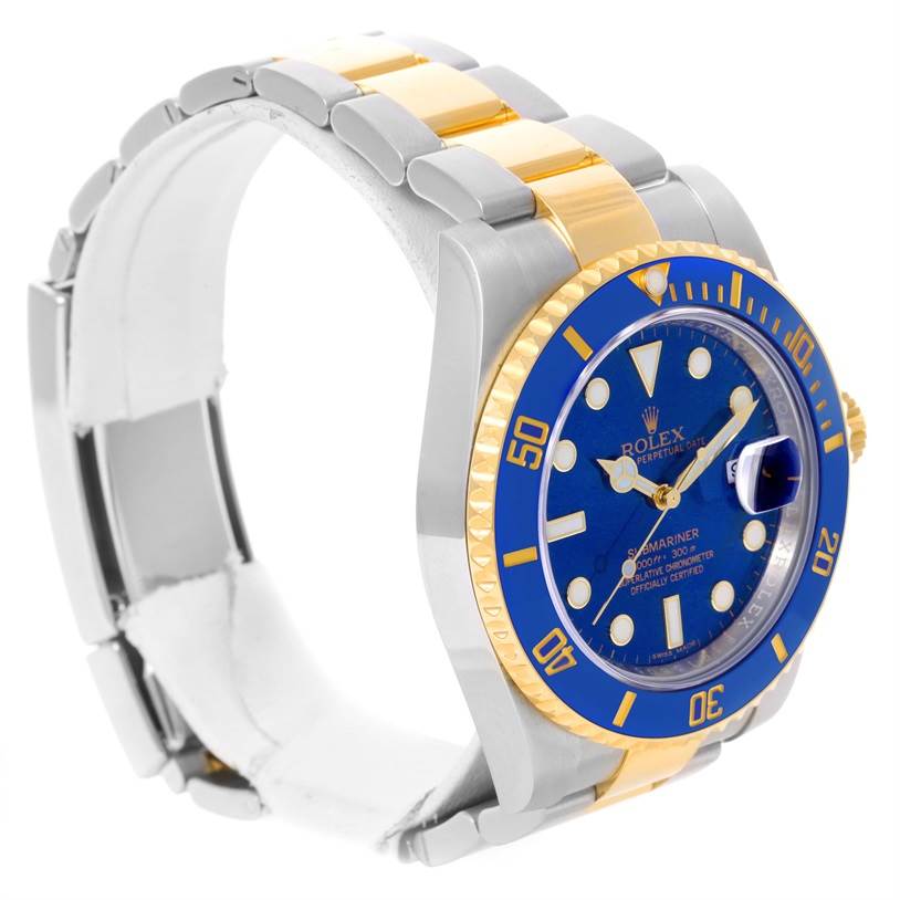 The Rolex Submariner 116613 Men's Steel and Gold (two tone) Blue Dial 116613 Men's Steel and Gold (two tone) Blue Dial watch is shown at an angled view, highlighting its blue bezel, blue dial, and two-tone metal bracelet.