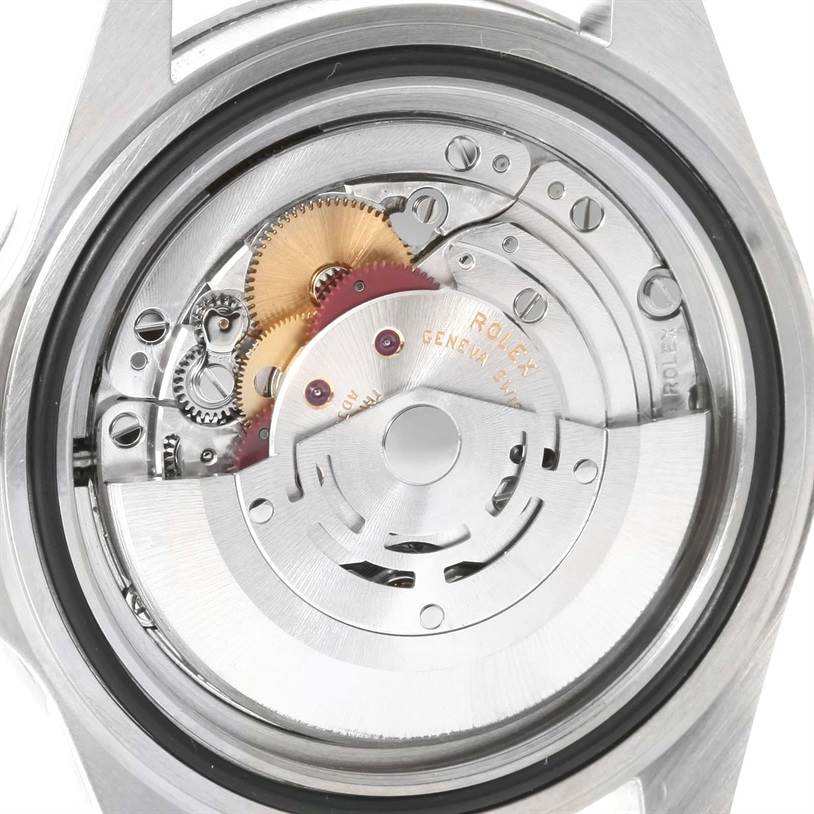 This image shows the intricate movement and inner mechanism of a Rolex Submariner 14060 Men
s Stainless Steel Black Dial 14060 Men
s Stainless Steel Black Dial watch.