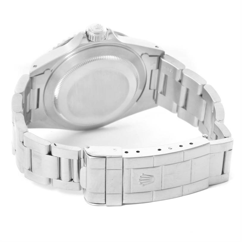 This image shows the backside of a Rolex Submariner 14060 Men
s Stainless Steel Black Dial 14060 Men
s Stainless Steel Black Dial watch, focusing on the bracelet, clasp, and case back.