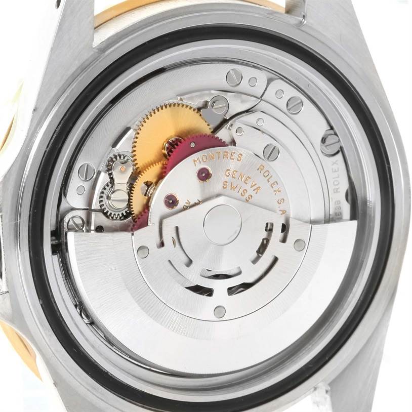 The image shows the inner mechanical movement of a Rolex Submariner 16613 Men
s Steel and Gold (two tone) Black Dial 16613 Men
s Steel and Gold (two tone) Black Dial watch, viewed from the back case.