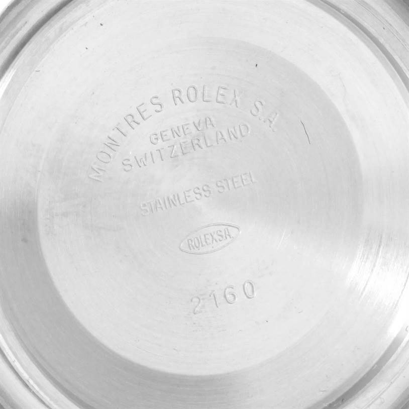 This image shows the inner case back of a Rolex Submariner 16613 Men
s Steel and Gold (two tone) Black Dial 16613 Men
s Steel and Gold (two tone) Black Dial watch, featuring engravings and model information.