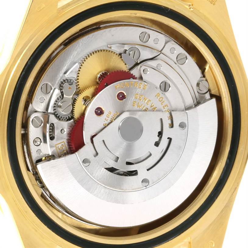 This image shows the internal mechanical movement of a Rolex Submariner 16618 Men
s Yellow Gold Black Dial 16618 Men
s Yellow Gold Black Dial watch taken from the back.