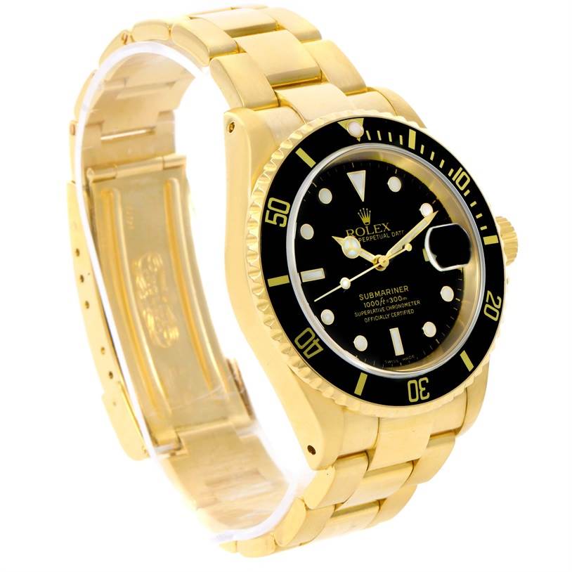The image shows a Rolex Submariner 16618 Men
s Yellow Gold Black Dial 16618 Men
s Yellow Gold Black Dial watch at a three-quarter angle, highlighting its gold bracelet, black dial, and bezel.