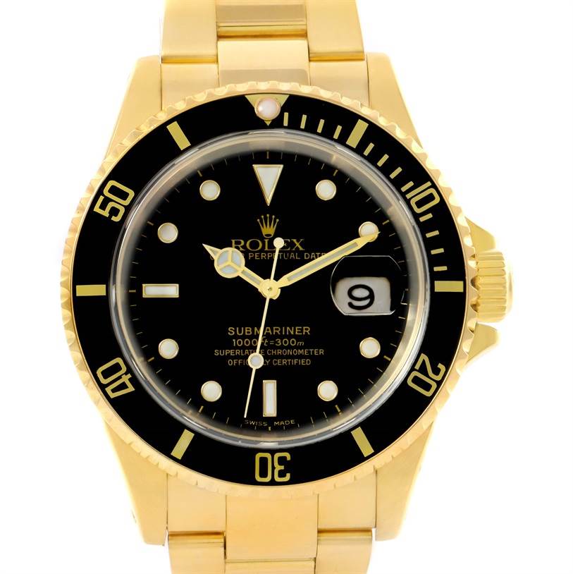 The Rolex Submariner 16618 Men
s Yellow Gold Black Dial 16618 Men
s Yellow Gold Black Dial watch is shown from the front, featuring its black dial, bezel, and date display at 3 o
clock.