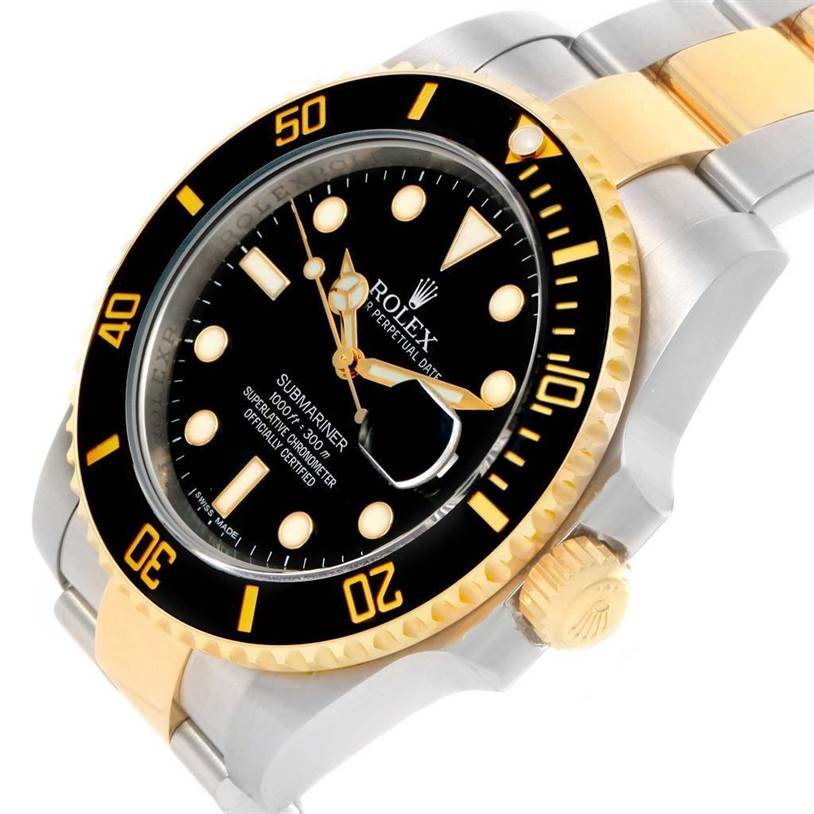 The image shows a close-up angled view of a Rolex Submariner 116613 Men
s Steel and Gold (two tone) Black Dial 116613 Men
s Steel and Gold (two tone) Black Dial watch, highlighting its bezel, dial, crown, and part of the bracelet.