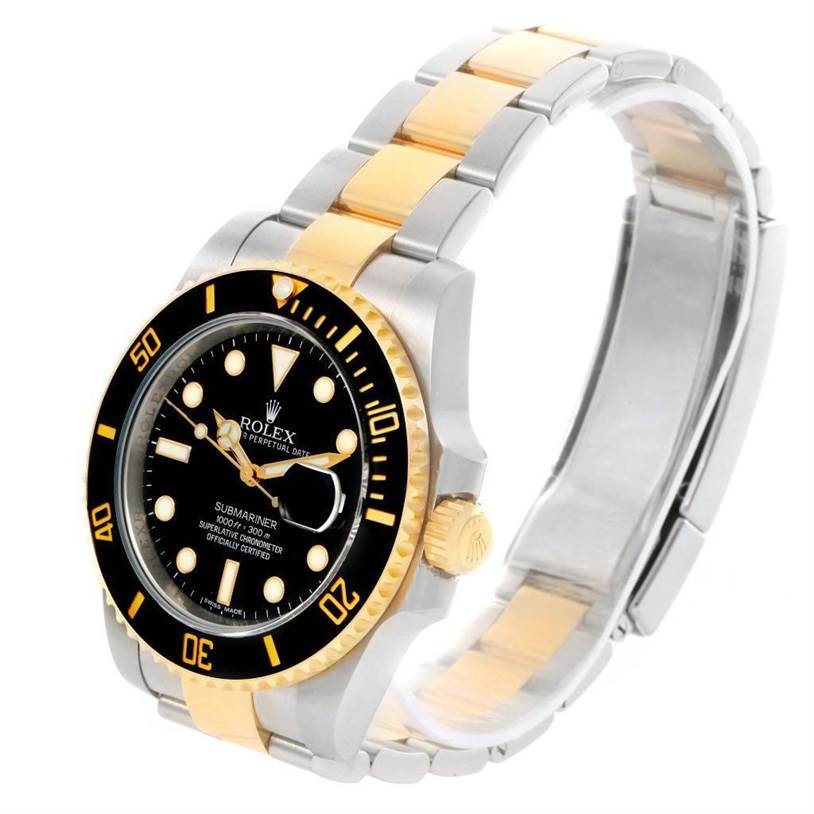 The image shows an angled view of the Rolex Submariner 116613 Men
s Steel and Gold (two tone) Black Dial 116613 Men
s Steel and Gold (two tone) Black Dial watch, highlighting the bezel, dial, and two-tone bracelet.