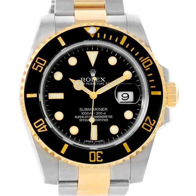 The image shows a frontal view of a Rolex Submariner 116613 Men
s Steel and Gold (two tone) Black Dial 116613 Men
s Steel and Gold (two tone) Black Dial watch, displaying its black dial, date window, and two-tone bracelet.