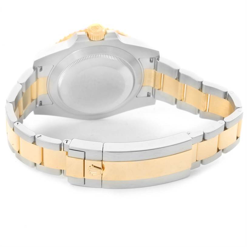 The image shows the back and bracelet of a Rolex Submariner 116613 Men
s Steel and Gold (two tone) Black Dial 116613 Men
s Steel and Gold (two tone) Black Dial, viewed from a slightly elevated rear angle.