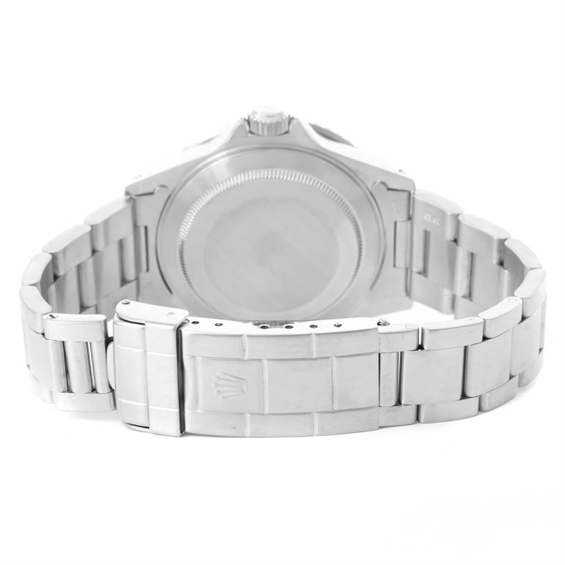 The image shows the back case and bracelet of a Rolex Submariner 16610 Men
s Stainless Steel Black Dial 16610 Men
s Stainless Steel Black Dial model taken from a rear angle.