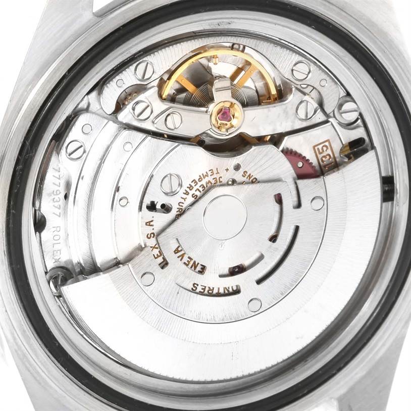 This image shows a close-up view of the movement and internal mechanisms of a Rolex Submariner 16610 Men
s Stainless Steel Black Dial 16610 Men
s Stainless Steel Black Dial watch.