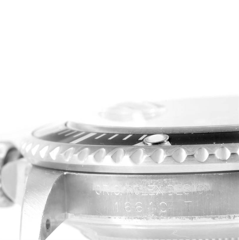 The image shows a close-up side angle of the bezel and case of a Rolex Submariner 16610 Men
s Stainless Steel Black Dial 16610 Men
s Stainless Steel Black Dial watch.