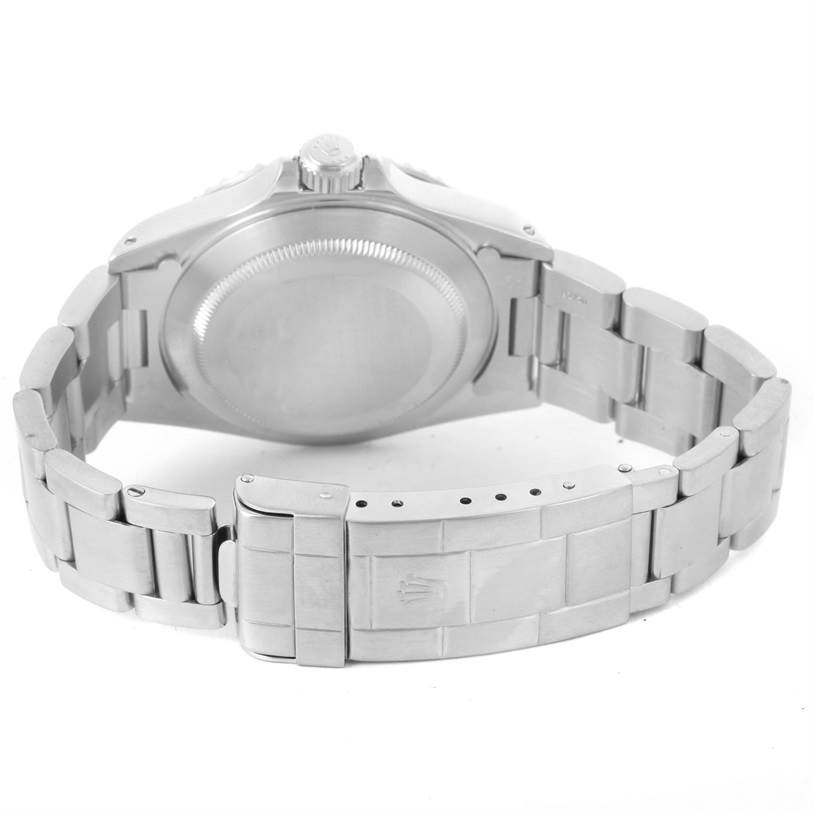 This image shows the back case and bracelet of a Rolex Submariner 14060 Men
s Stainless Steel Black Dial 14060 Men
s Stainless Steel Black Dial watch from a rear angle.