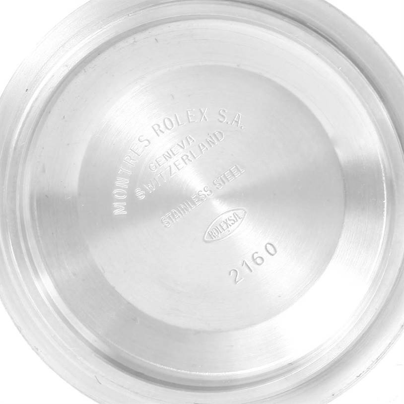 The image shows the stainless steel case back of a Rolex Submariner 14060 Men
s Stainless Steel Black Dial 14060 Men
s Stainless Steel Black Dial watch, viewed from the inside.