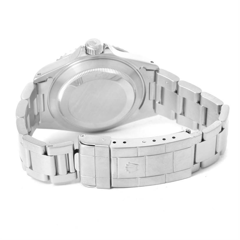 The image shows the back view of a Rolex Submariner 14060 Men
s Stainless Steel Black Dial 14060 Men
s Stainless Steel Black Dial watch including its bracelet and clasp.