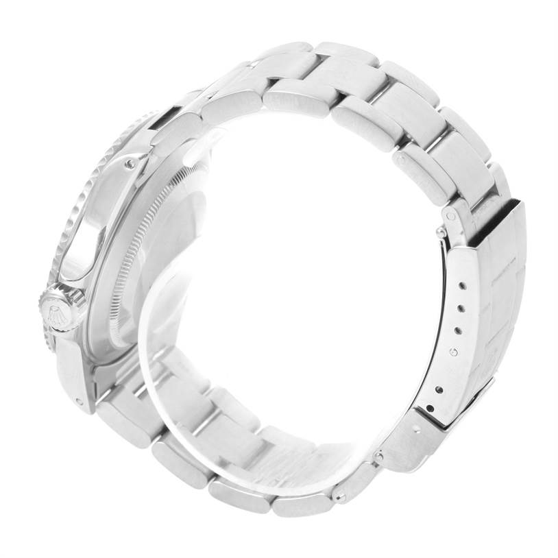 The image shows the side and bracelet of a Rolex Submariner 14060 Men
s Stainless Steel Black Dial 14060 Men
s Stainless Steel Black Dial, highlighting the crown, case, and part of the clasp.