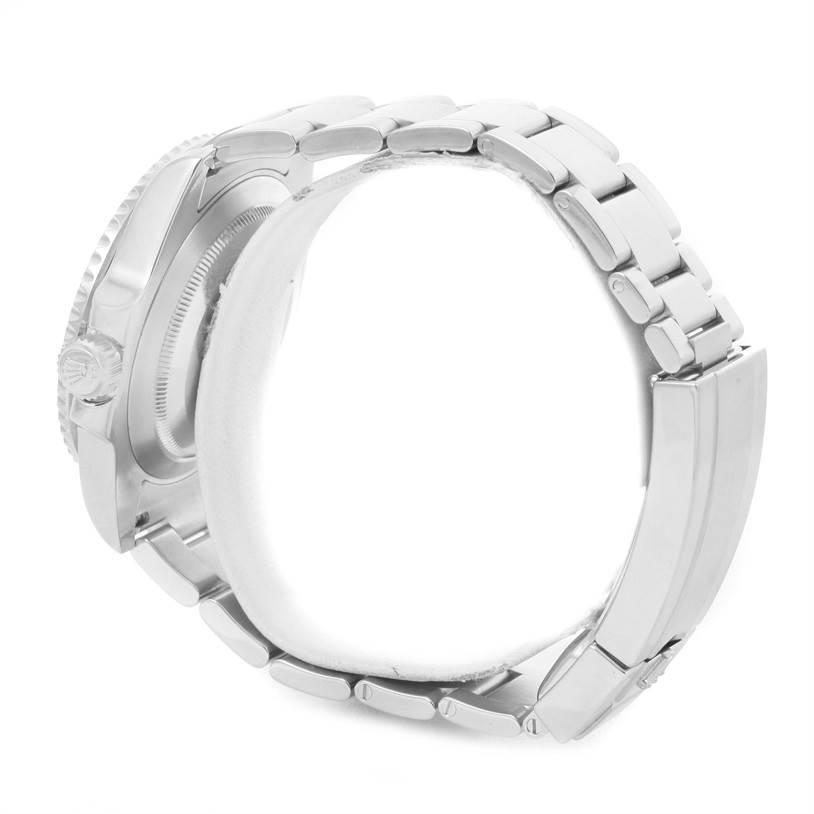 The image shows a side view of the Rolex Submariner 116610 Men
s Stainless Steel Black Dial 116610 Men
s Stainless Steel Black Dial watch, highlighting its stainless steel bracelet, clasp, and side of the case.