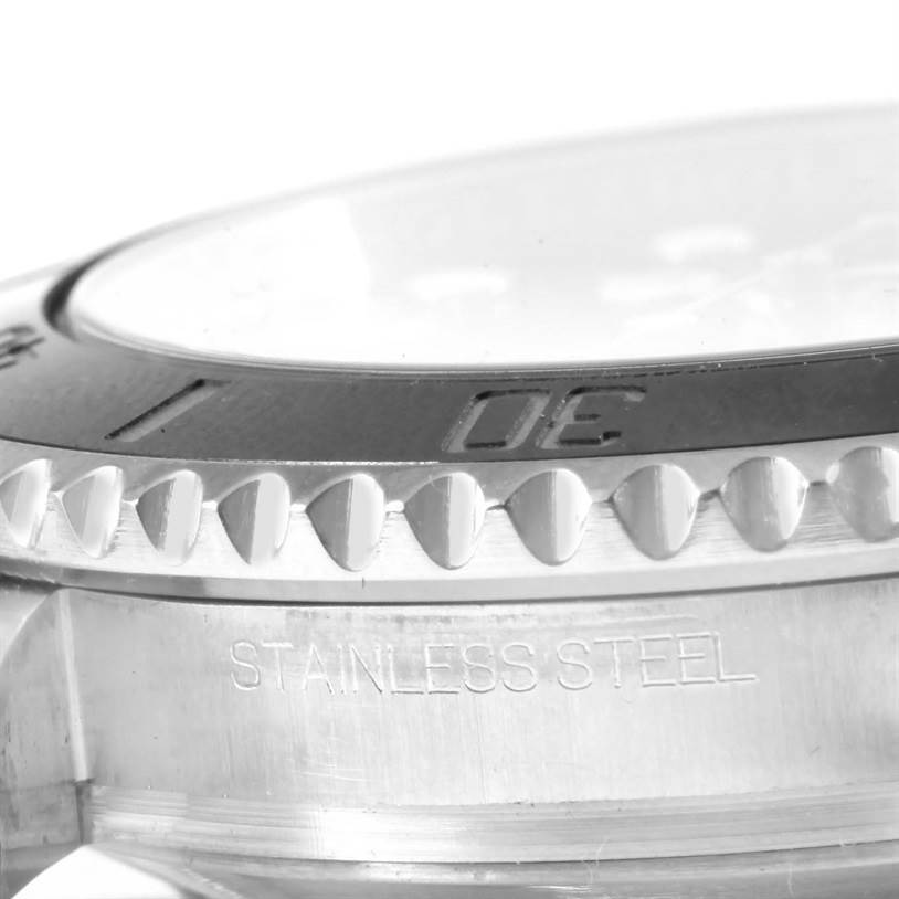 Close-up angle of the bezel and case side, revealing the "STAINLESS STEEL" engraving on a Rolex Submariner 116610 Men
s Stainless Steel Black Dial 116610 Men
s Stainless Steel Black Dial.