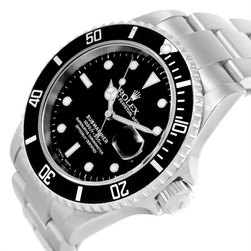 The image shows a close-up view of the Rolex Submariner 16610 Men
s Stainless Steel Black Dial 16610 Men
s Stainless Steel Black Dial
s face, bezel, and a portion of the metal bracelet at an angled side view.