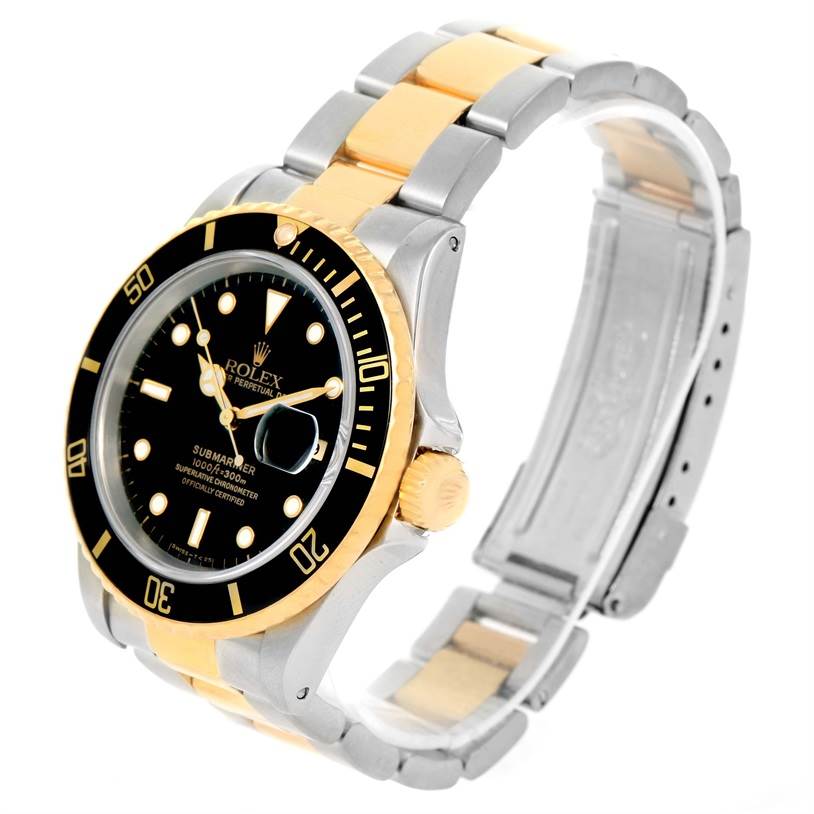 This image shows a Rolex Submariner 16613 Men
s Steel and Gold (two tone) Black Dial 16613 Men
s Steel and Gold (two tone) Black Dial watch at an angle displaying its dial, bezel, crown, and bracelet.