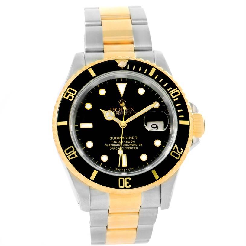 The image shows a Rolex Submariner 16613 Men
s Steel and Gold (two tone) Black Dial 16613 Men
s Steel and Gold (two tone) Black Dial watch from a front angle, highlighting its black dial, bezel, and two-tone bracelet.
