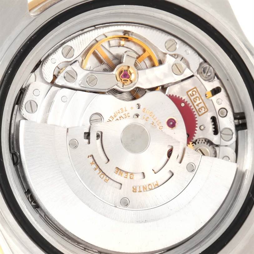 The image shows the internal movement mechanism of a Rolex Submariner 16613 Men
s Steel and Gold (two tone) Black Dial 16613 Men
s Steel and Gold (two tone) Black Dial watch from a close-up, top-down angle.