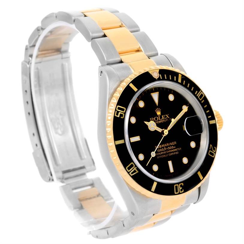 The image shows a side angle of a Rolex Submariner 16613 Men
s Steel and Gold (two tone) Black Dial 16613 Men
s Steel and Gold (two tone) Black Dial watch, displaying its face, bezel, and two-tone bracelet.