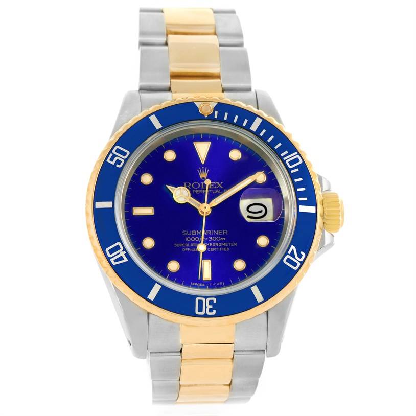 The Rolex Submariner 16803 Men's Steel and Gold (two tone) Blue Dial 16803 Men's Steel and Gold (two tone) Blue Dial watch is shown from a front angle, highlighting its blue dial, bezel, and two-tone metal bracelet.