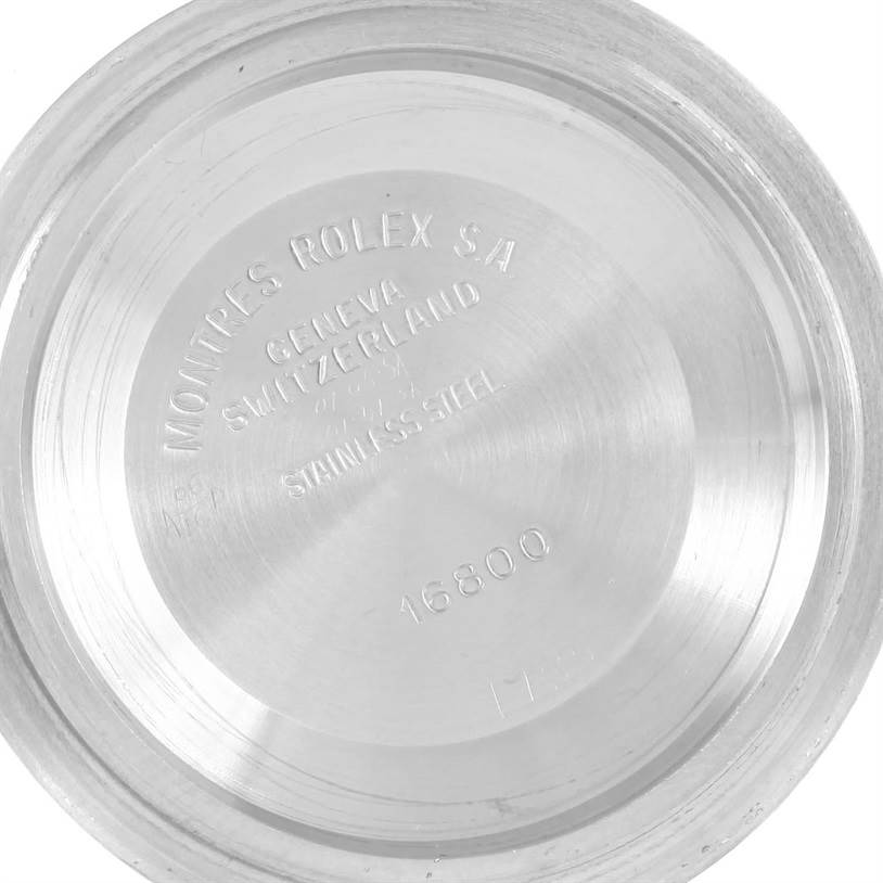 The image shows the interior case back of a Rolex Submariner 16803 Men's Steel and Gold (two tone) Blue Dial 16803 Men's Steel and Gold (two tone) Blue Dial watch model 16800.