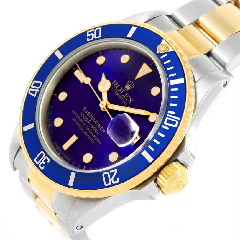 This Rolex Submariner 16803 Men's Steel and Gold (two tone) Blue Dial 16803 Men's Steel and Gold (two tone) Blue Dial watch is shown at an angled close-up, displaying the dial, bezel, crown, and part of the bracelet.